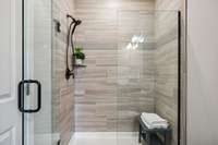 Primary bathroom also has a tiled walk in shower with glass door & recessed light. 549 Montrose Dr. Mt. Juliet, TN 37122