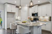 Your kitchen features ample cabinet storage, granite countertops, & subway tile backsplash. 549 Montrose Dr. Mt. Juliet, TN 37122