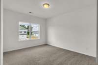 Large bedroom for the upstairs junior en suite.