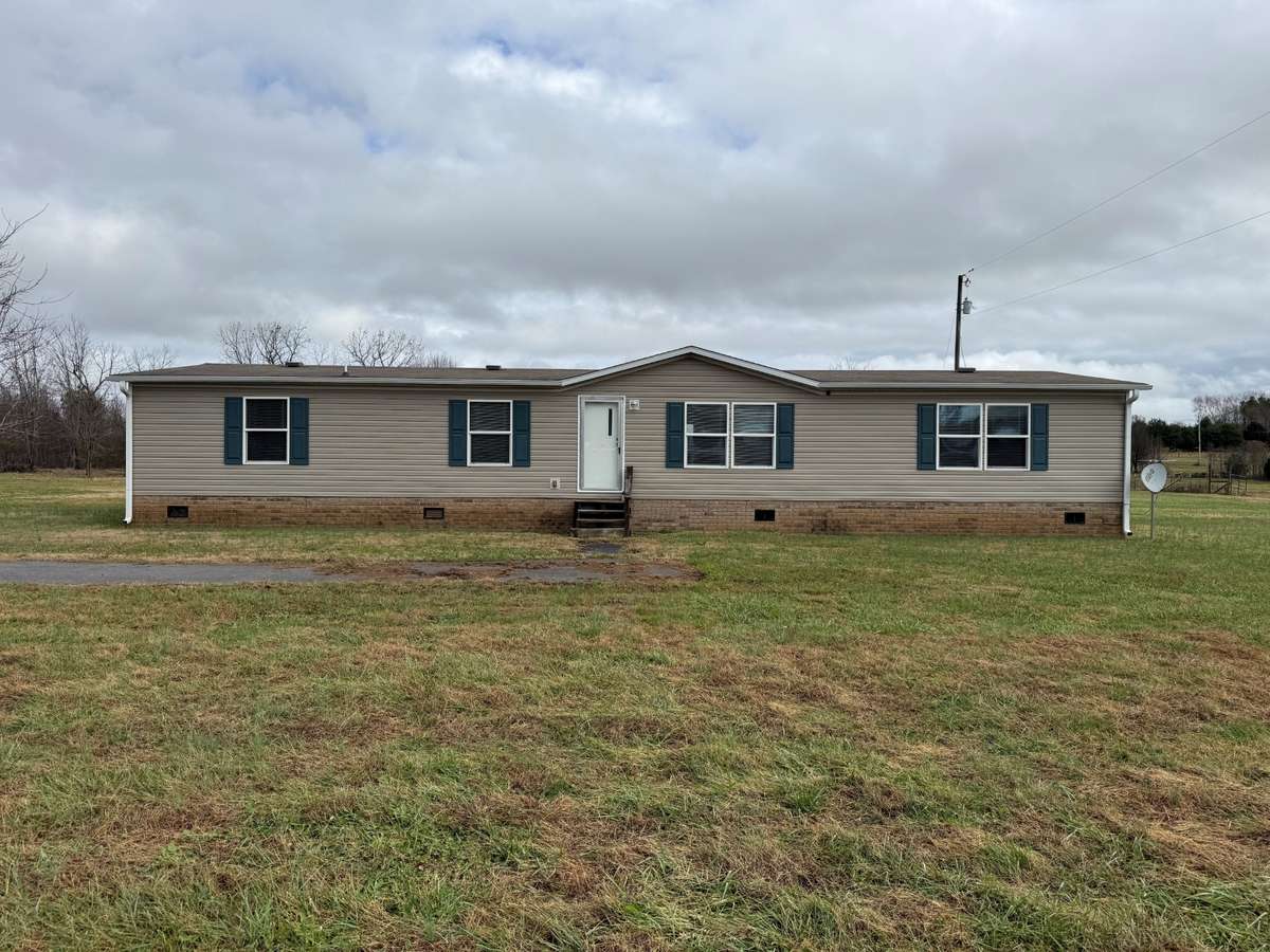 Front of house- permanent foundation, new vinyl siding and gutters, composition shingle roof,