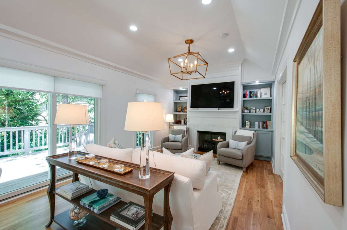 The home is drenched in natural light with its beautiful tall Replacement by Anderson windows.