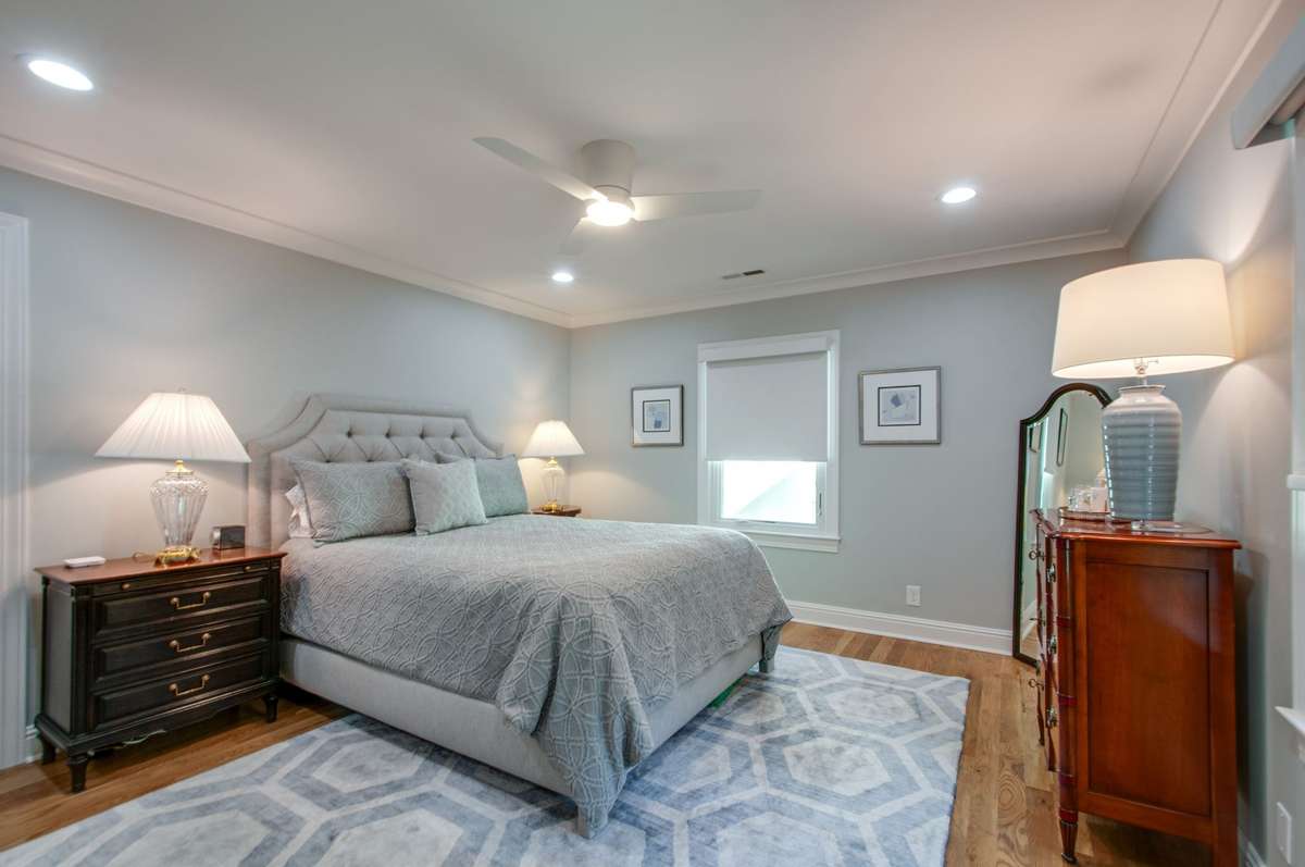 The upper level primary bedroom has two windows, great lighting and two closets.