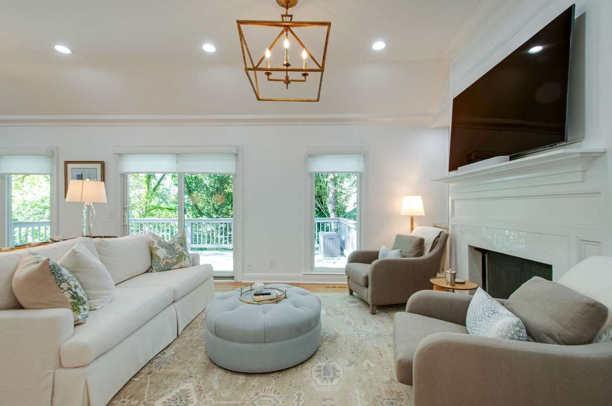 Welcome to 3803A Woodmont Lane -- a total renovation in Green Hills drenched in natural light and surrounded by lush greenery!