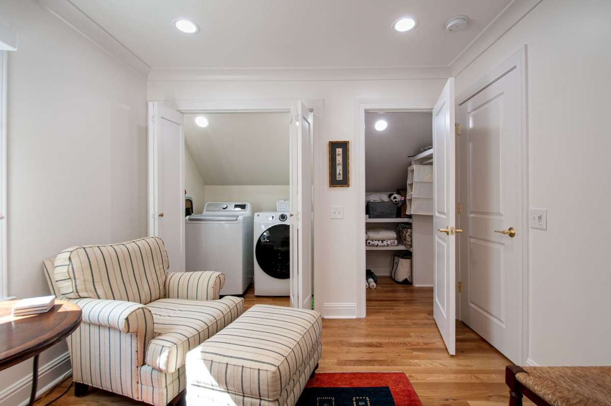 The washer and dryer have been moved to the double closet (to create a powder room on the main level) and there is still a large walk in closet in the room.