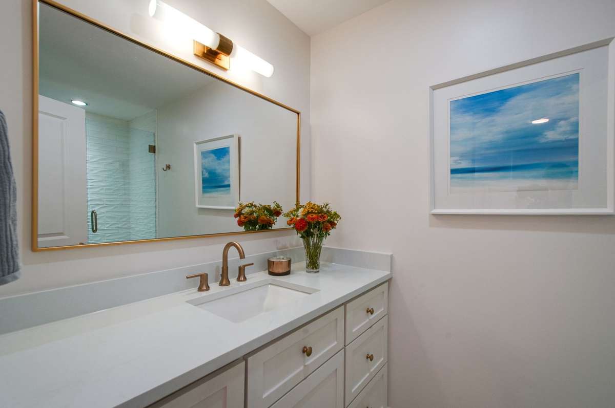 The ensuite main floor full bathroom is fully renovated and totally spa-worthy!