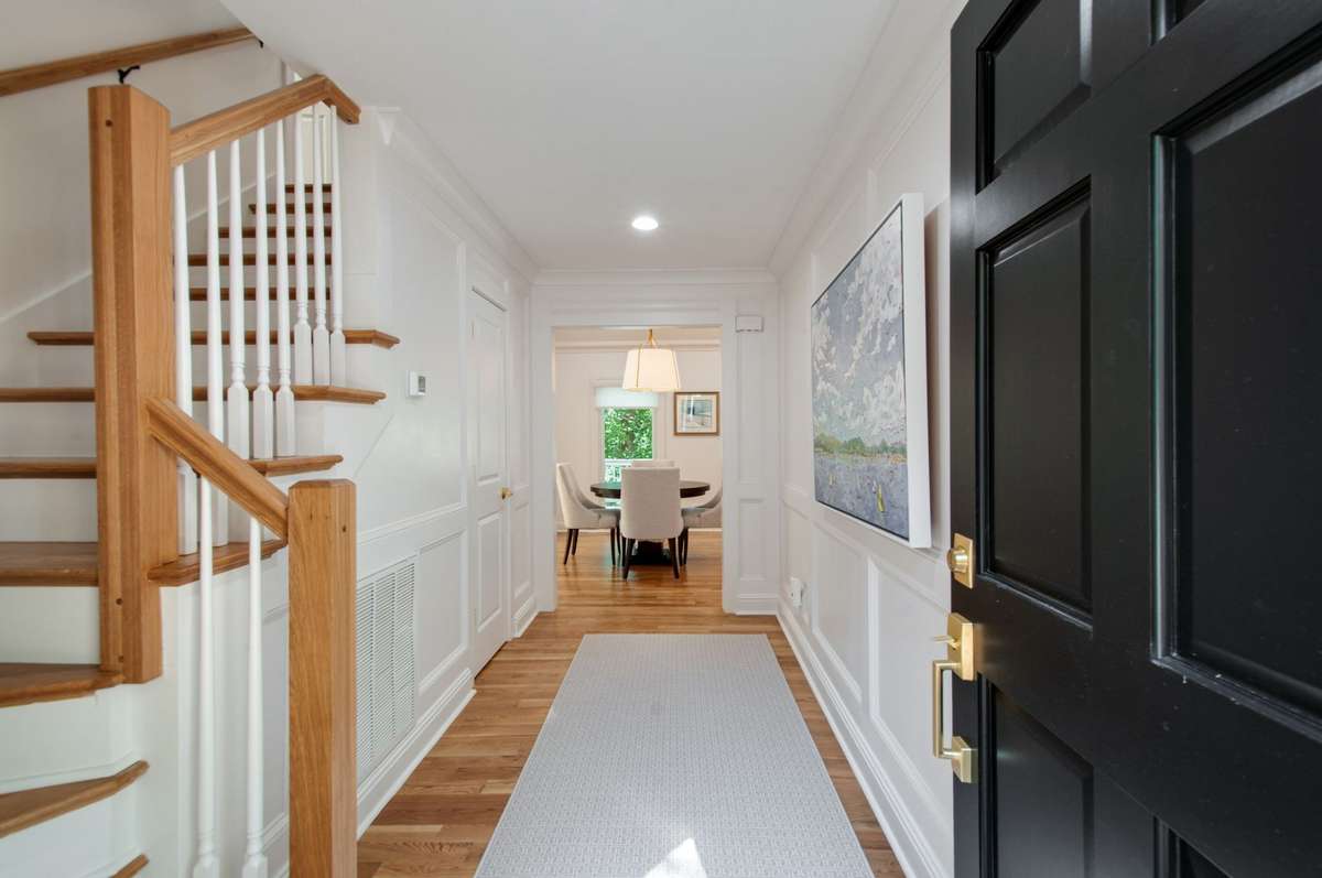 Step into an elegant foyer that sets the tone for the rest of the home