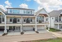 Rear Elevation showing 2 Car Garage & Covered Driveway Parking