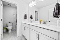 Upstairs full bath complete with 2 sinks