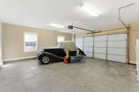 Two car garage with lot's of extra room for storage