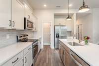 How would you like to customize your new kitchen? We have multiple options available for your cabinets, countertops, etc. We also have an option for built-in oven and microwave, and hood vent. *Photos not of exact home*