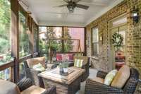 The porch area has a seamless flow from inside to outside; an extension of the family room