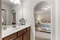 Connecting bath with private vanity area and shared shower/toilet area