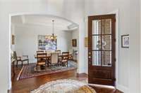 Bright entry foyer with formal dining and living on either side