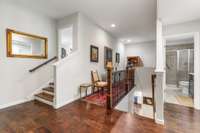 Upstairs landing is large enough for library/read nook or space for a desk;s stairs lead to XL bonus room