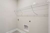 The Laundry Room is located on the 1st floor and includes tile flooring.