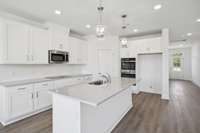 ***Photo from a previously built Hampstead home - options may vary***

Stainless steel appliances have been included in your kitchen including an electric cooktop, double oven, microwave and dishwasher.