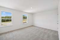 ***Photo from a previously built Hampstead home - options may vary***

Bedroom #4 measures 15' x 12' and also includes a massive walk-in closet.