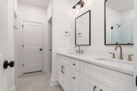 Retreat to the stunning primary suite bathroom, where spa-like luxury invites you to unwind and recharge in style.