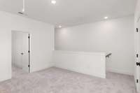 Upstairs loft offers a great spot for an office, doing homework, movie nights, or a cozy reading nook.