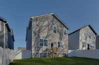 Enjoy the privacy and space of this generously sized, fully fenced backyard-perfect for entertaining, gardening, or letting your pets roam free.