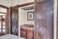 The built-in dresser and 2 closets provide great storage in the bedroom.