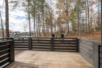 The deck off the bedroom has plenty of space for lounging furniture while taking in the lake view and the star-filled sky!