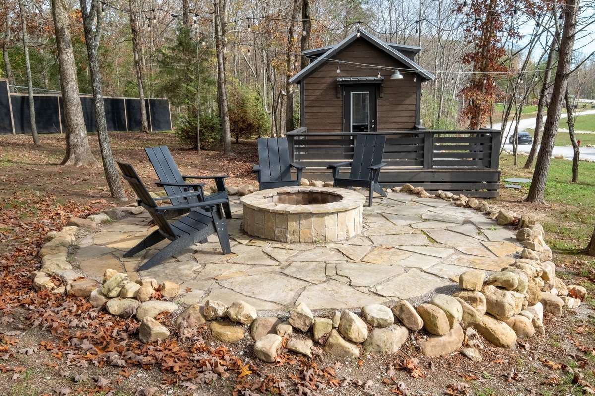 Custom built resort-like fire pit with views of the lake for days!