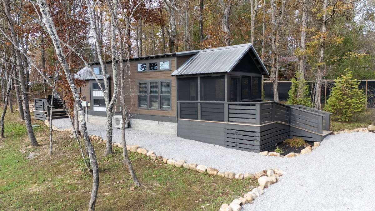 Quaintness and serenity awaits you whether you use the house as a weekend retreat or live in it year round. The house is currently used as a short term vacation rental and new owners have the option to assume future bookings.