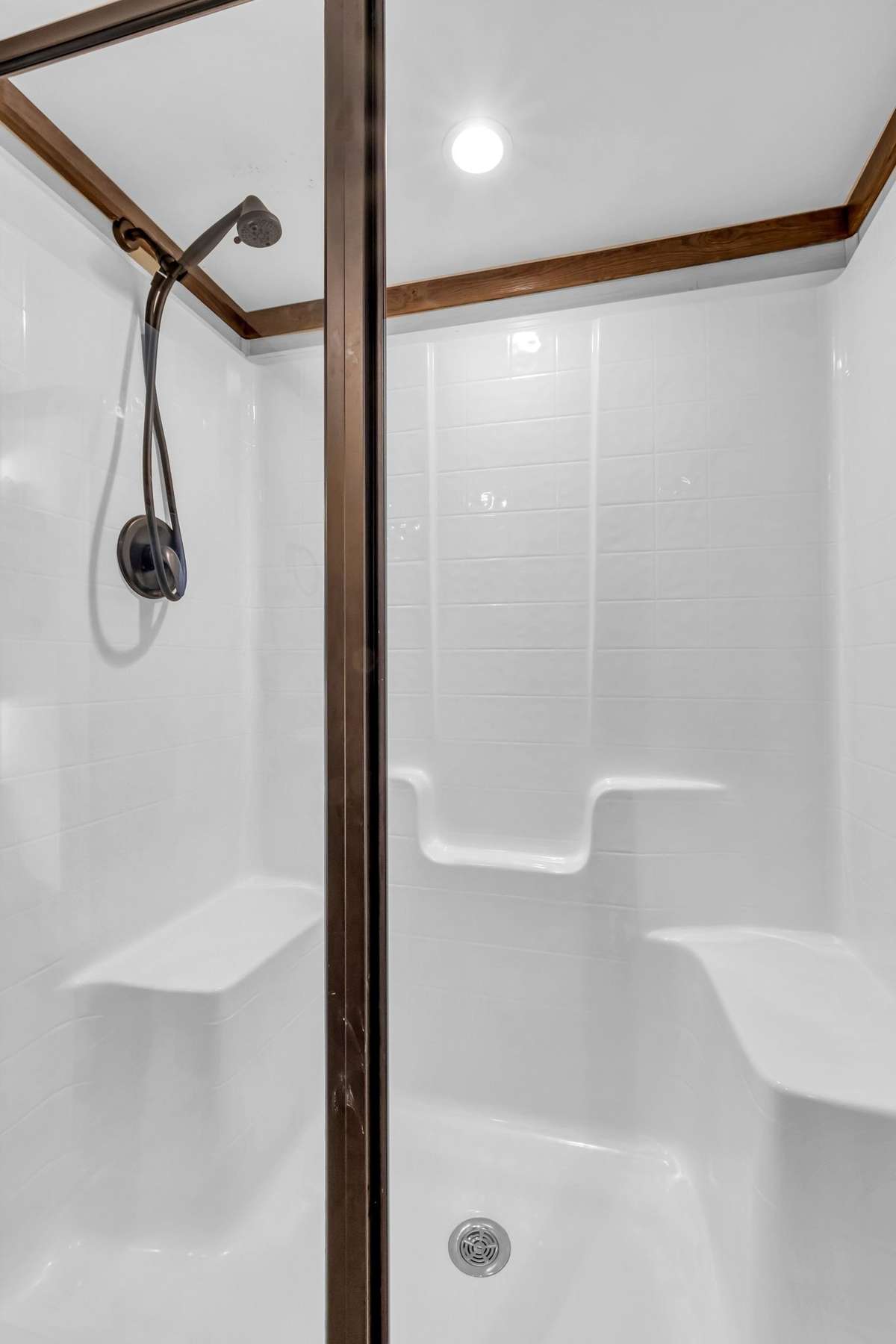 Walk-in shower with a glass door