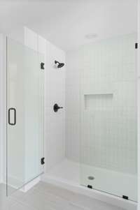 walk in shower in primary bath. Picture not of actual home but similar model.