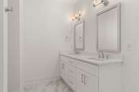 double vanities in primary. Picture not of actual home but similar model.