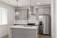 Picture not of actual home but similar model. stainless steel appliances