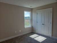 Third Bedroom has Double Door Closet.  Picture of Similar House.
