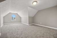 Large Bonus Room Upstairs for Entertaining and Enjoying Sports and Movies!