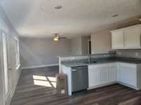 Extra Upgraded Dark Gray Cabinets and Granite Counter Tops in the Kitchen.
Picture of Previous House.