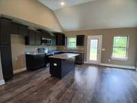 Kitchen has Upgraded Stove with Convection Oven and Air Fryer. 
Photo of previous house.