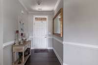 Foyer entrance with a welcoming feel from the front door to the living great room.