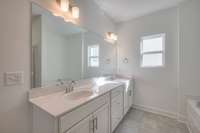 This photo is a sample of the Sutherland floorplan.  Options and exterior will vary depending on customer selections and preferences.