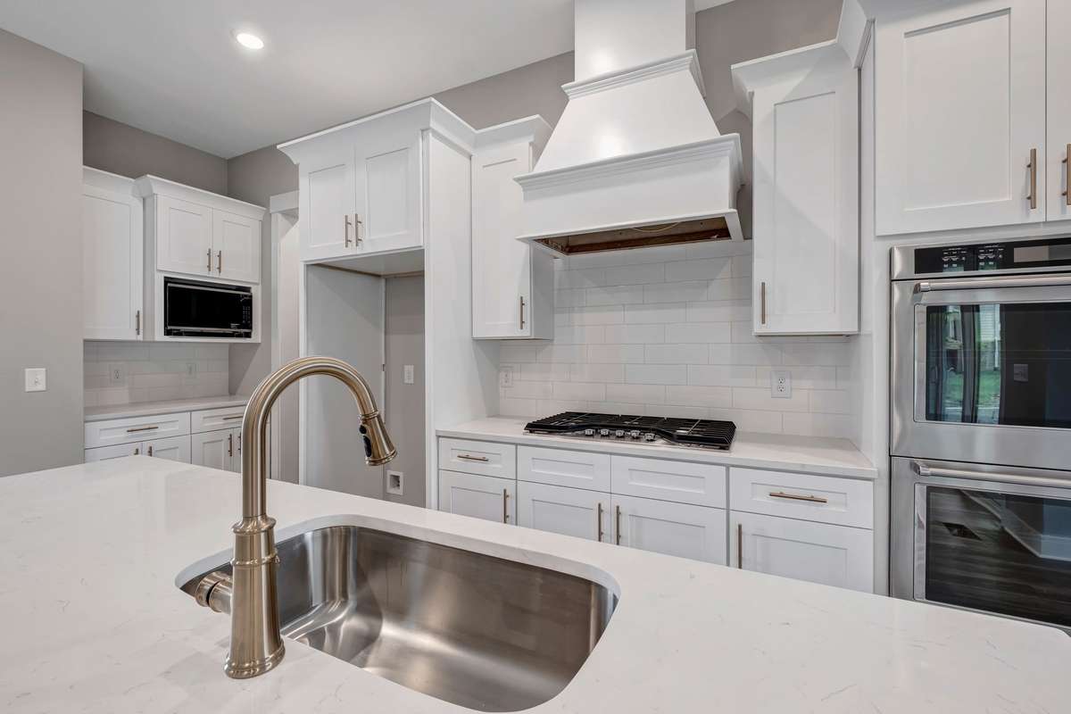 Example of the builder's work on other homes in Saddle Ridge and of the design features and finishes available.