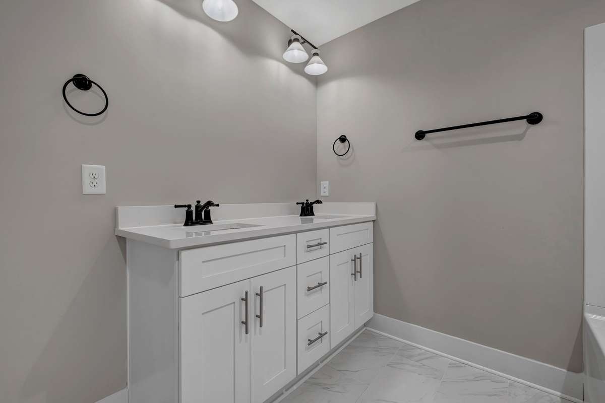 Example of the builder's work on other homes in Saddle Ridge and of the design features and finishes available.