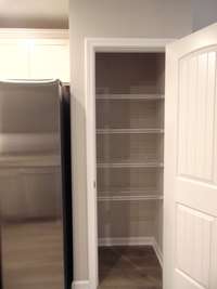 This kitchen is perfect for you to cook all your favorite dishes, the kitchen comes with steel appliances, crown cabinetry, under cabinet lighting, and plenty of cabinets for you to store all your goods.