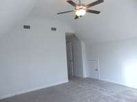 The bonus room which has large windows , can be used as an office, or play room