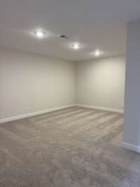 Another view of the Media room in the lower level basement. It could be a craft room or playroom or office...the options are endless with all this space!