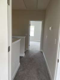 Hallway to 2 secondary bedrooms