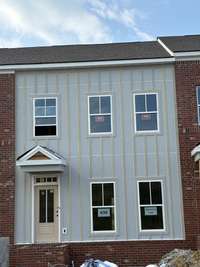 Actual front Exterior.  All interior photos are of another Highland previously built and may show colors and upgrades not available in this home