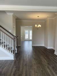 Welcome home to your new townhome. 5.25" baseboards and crown moulding included on main first floor.  Laminate flooring.  Hardwood treads on all staircases.