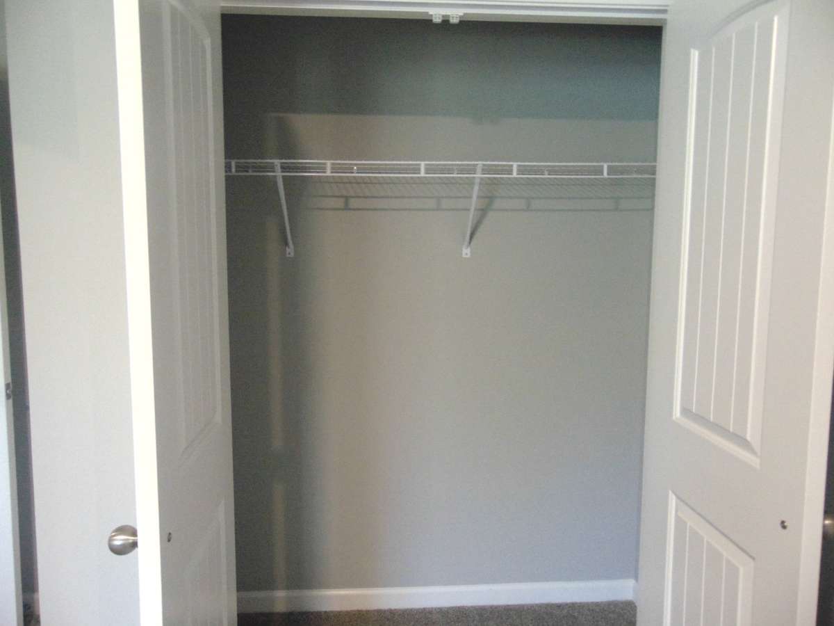 The third bedroom with large windows for that nature lighting, as well as your closet with 
a convenient rack.