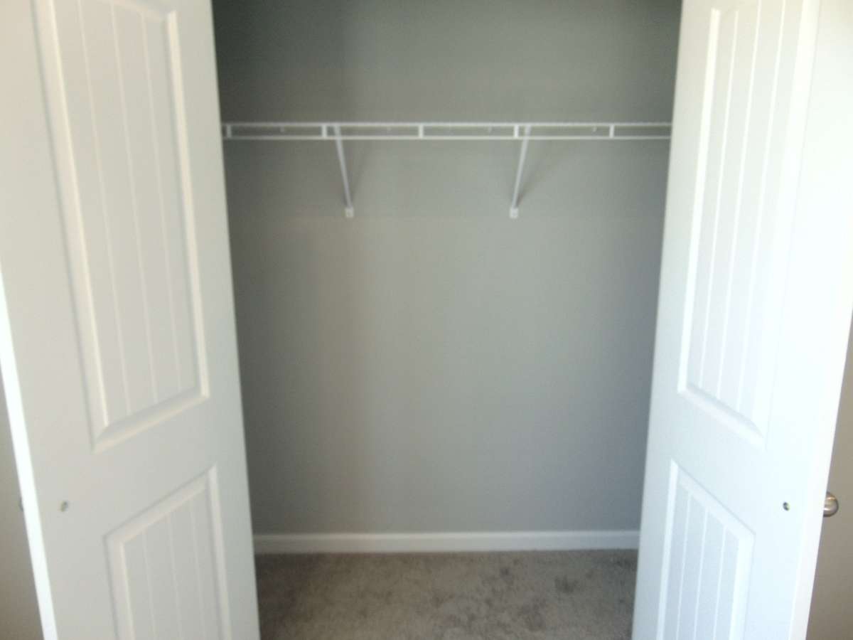 A bonus room which can be used as an extra bedroom, office, or game room. It has large windows, and a closet to store.
