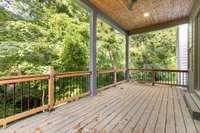 The covered porch is large and spacious and perfect for entertaining.