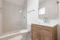 bedroom 4 ensuite bathroom with a full shower